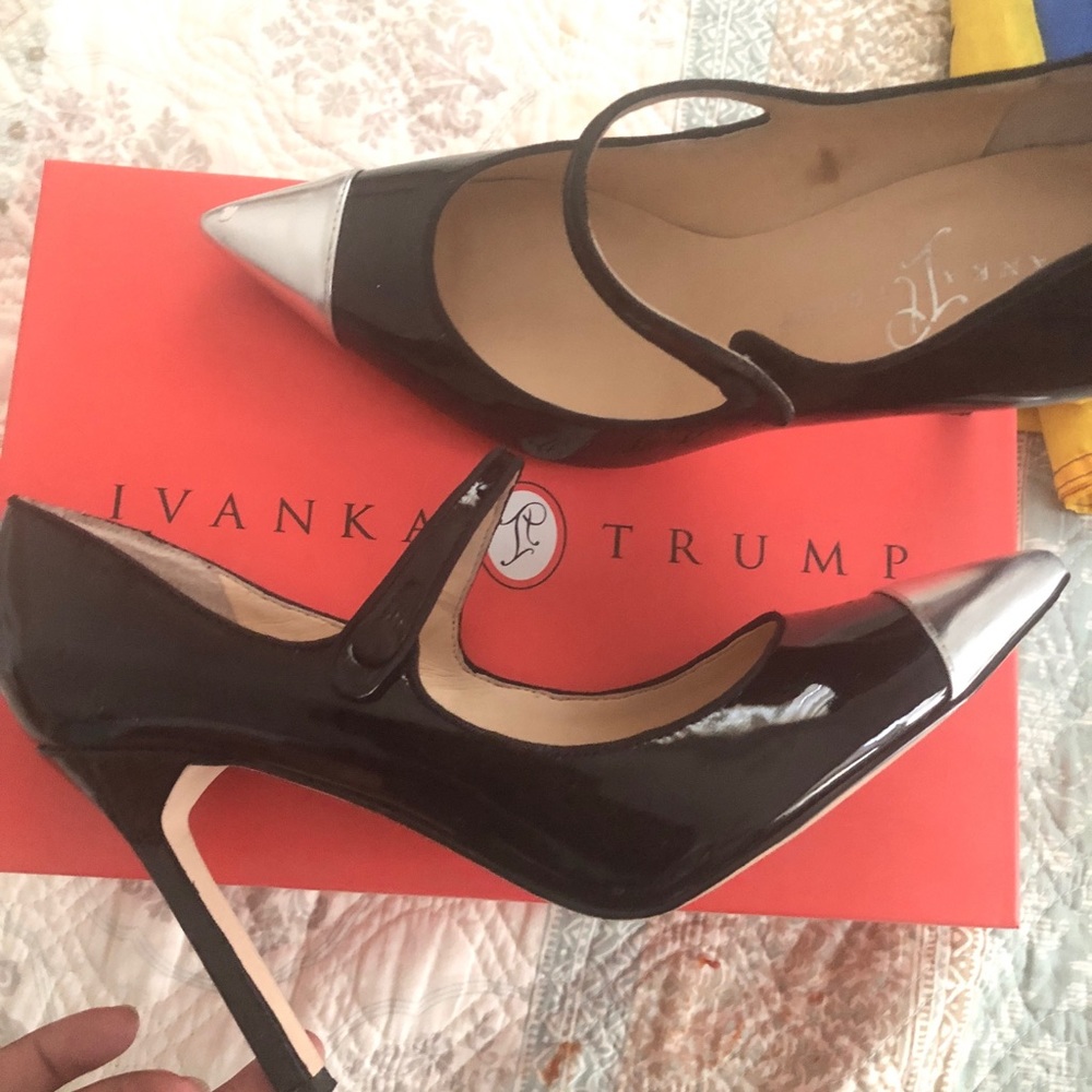 Black patent leather pump/silver metallic toe.